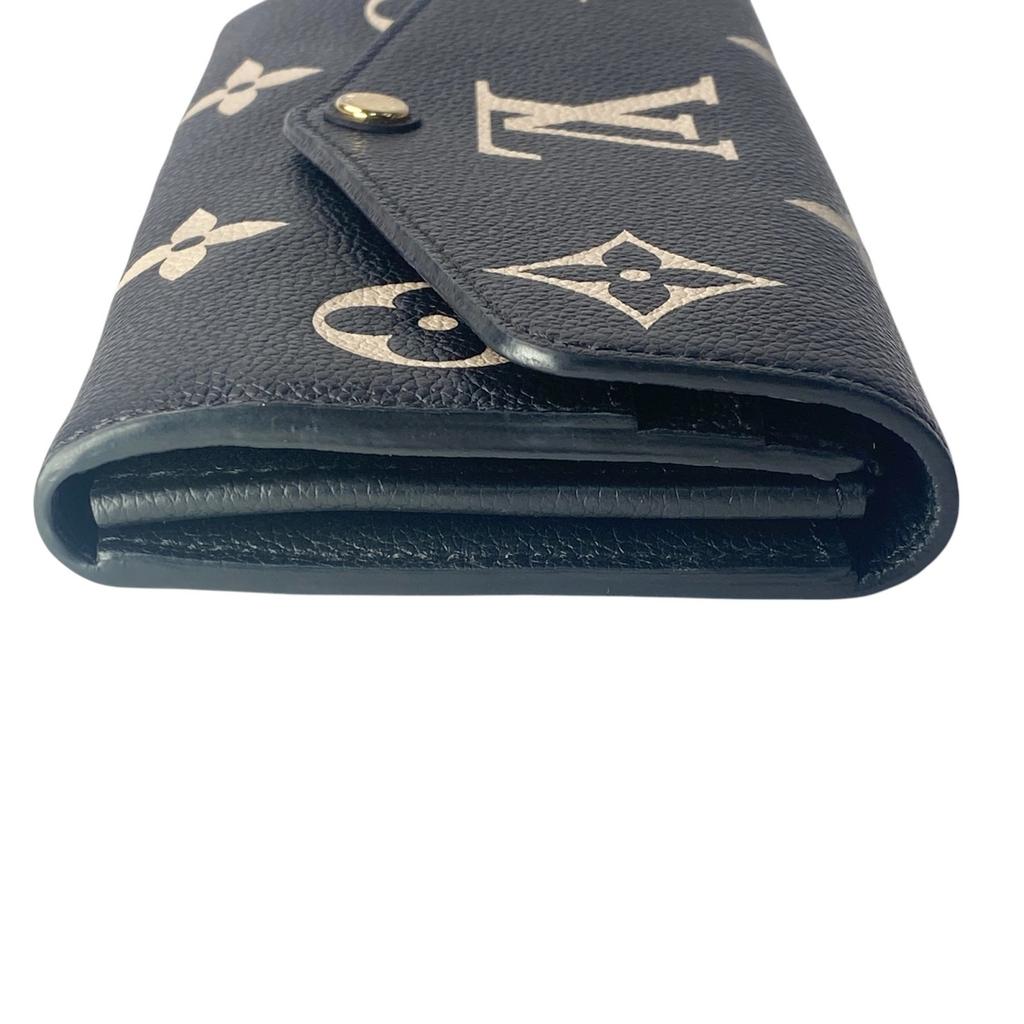 Подержанный кошелек LOUIS VUITTON Серия Black/Кремовый тип кожа Женский