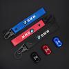 Tire Valve Stems Cap HKRH455 Car Keychain Wheel Air Valve Cover For BMW X5 X6 F30 F34 F10 F20 G20 G30 F15 F16 1 3 5 7 Series Sticker
