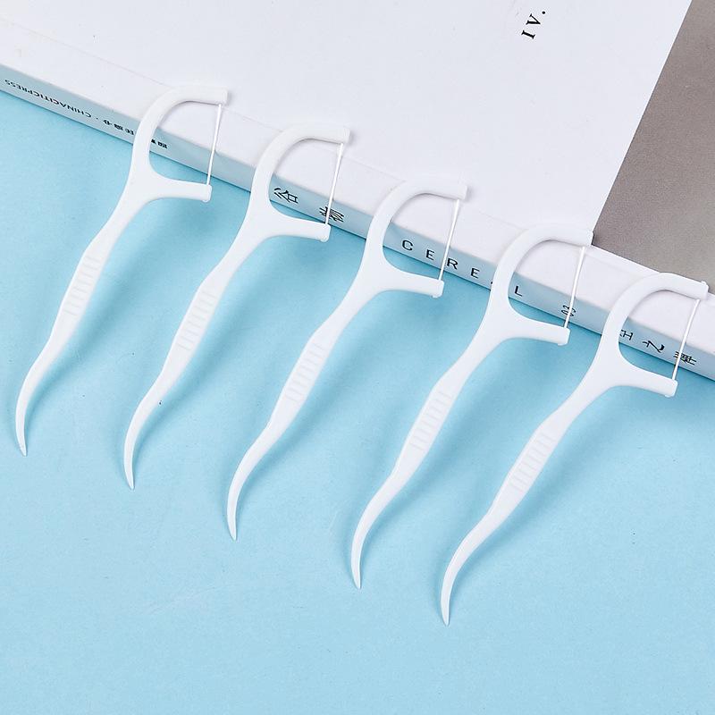 Индивидуальная герметичная упаковка. Зубные нити для чистки зубов в дорожном футляре. Очень прочный выбор зубной нити.