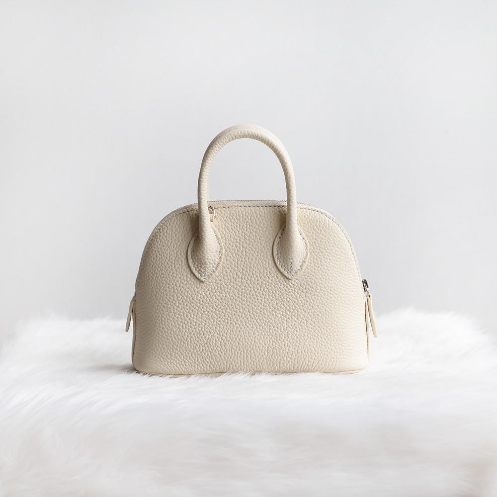 Fashion first-layer cowhide shell bag, bowling bag, mini leather women's bag, commuter versatile portable shoulder messenger bag