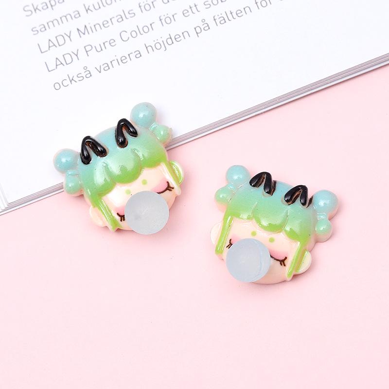 Cartoon Girl Bubble Dragon DIY Phone Case, Patches, Hair Clip, Crocs, and Water Bottle Decor.