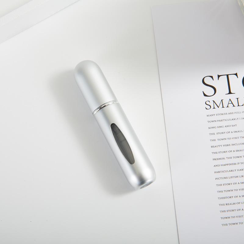 Compact 5ml Self-Pump Spray Perfume Bottle with Aluminum Press Design