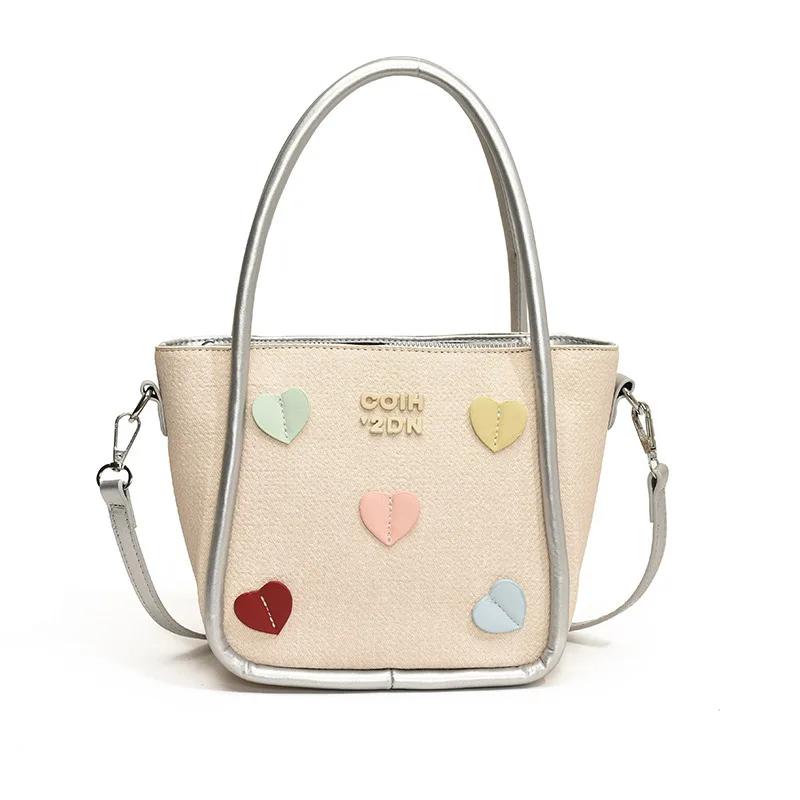 Корейская версия Ins Trendy Portable Bucket Bag Женская летняя новая простая повседневная сумка через плечо Feeling Messenger Bag