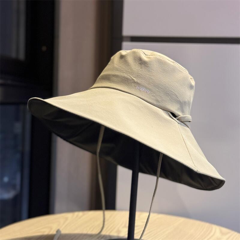 Spring and summer new black vinyl sunscreen versatile hat for women, UV protection, large brim fisherman hat, outdoor sunshade sun hat