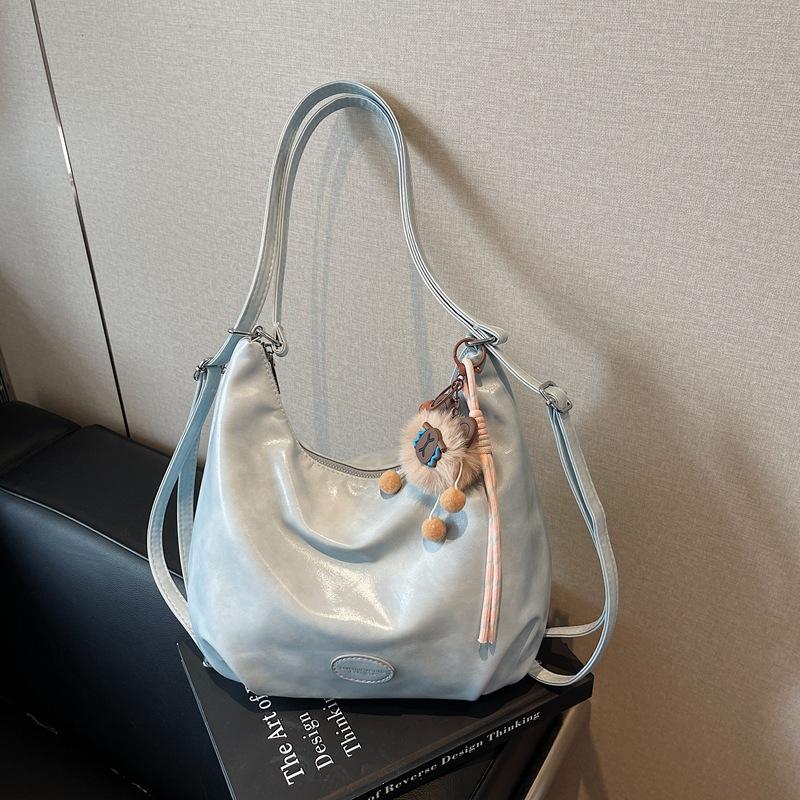 Женская сумка-тоут большой вместимости 2025 новая повседневная универсальная на плечо мессенджер сумка для поездок многофункциональный рюкзак корейская версия