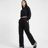 New Balance Широкие тренировочные брюки унисекс Carpenter черные Nbmle4a913 19