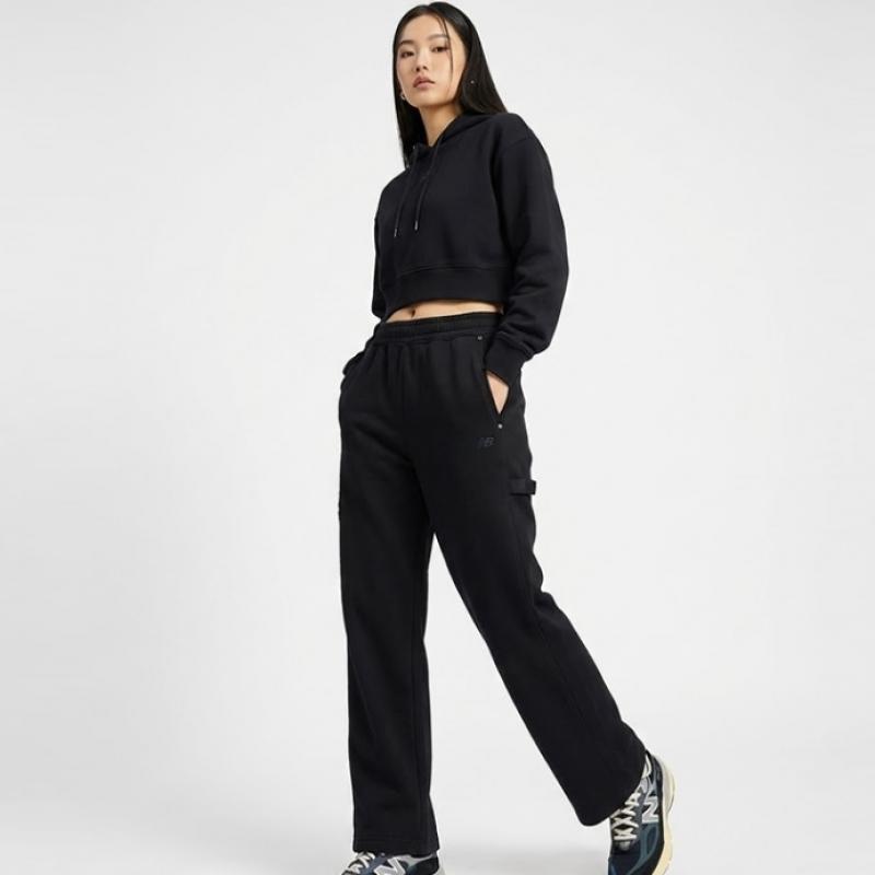 New Balance Широкие тренировочные брюки унисекс Carpenter черные Nbmle4a913 19