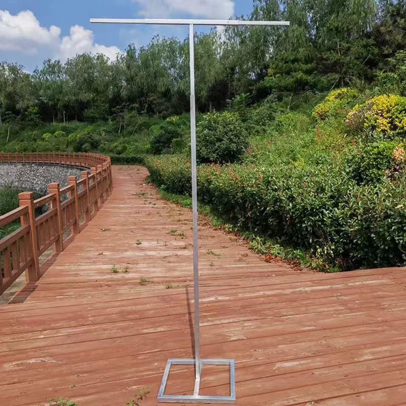 Elegant Wrought Iron Wedding Arch with Chiffon Drapery for Lawn Ceremonies