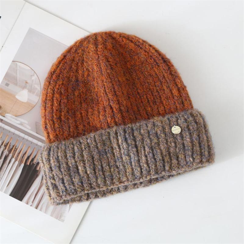 Autumn and winter color matching wool hat female winter couple cold-proof knitted hat versatile thermal ear protection hat shopping cold hat