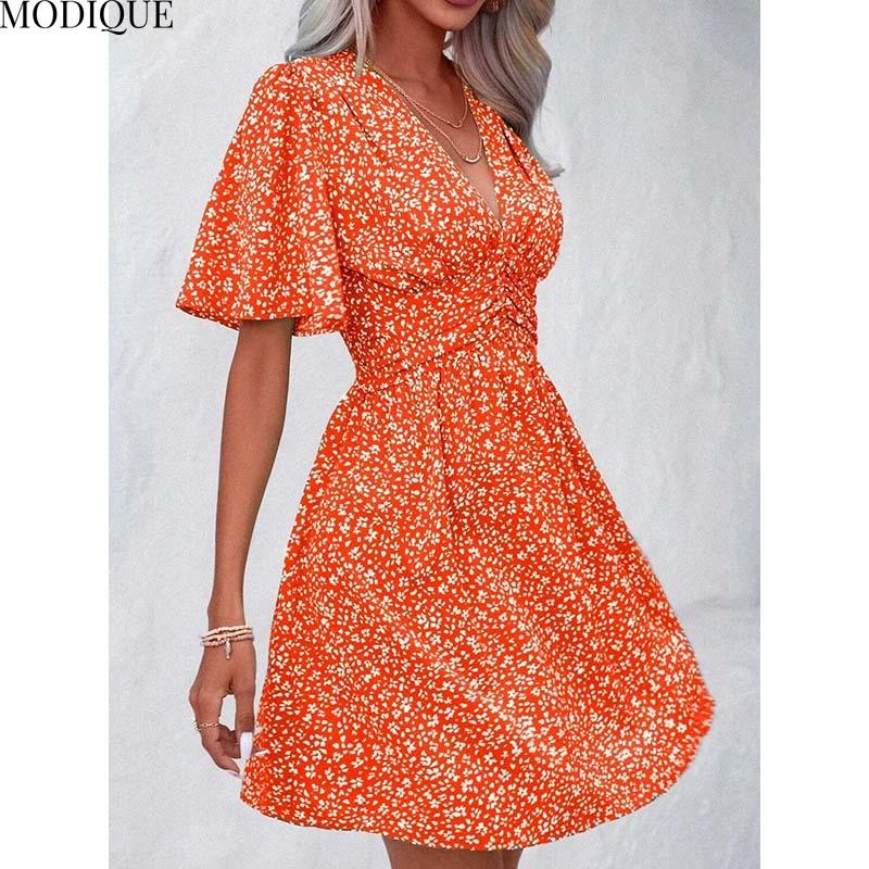 MODIQUE 2025 Summer New Women's Sexy Casual Floral Printing Ruffles Elastic Waist Short Dress Ladies X-Line Hot Batwing Sleeve V-Neck Dress