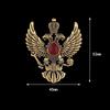 Винтажная брошь в виде двуглавого орла из сплава и смолы