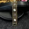 Vintage Palace Style Alloy Bracelet With Gem Inlay Retro Carved Hollow Hand Jewelry Women