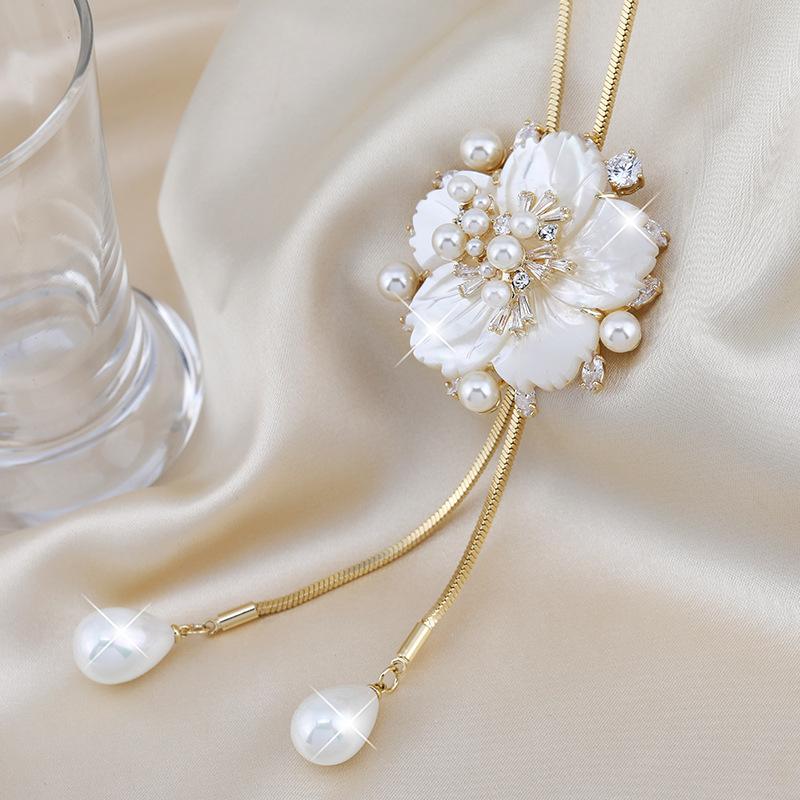 2021 Autumn And Winter Shell Flower Sweater Chain Women'S Fashion Simple Atmosphere Pearl Fringed Necklace
