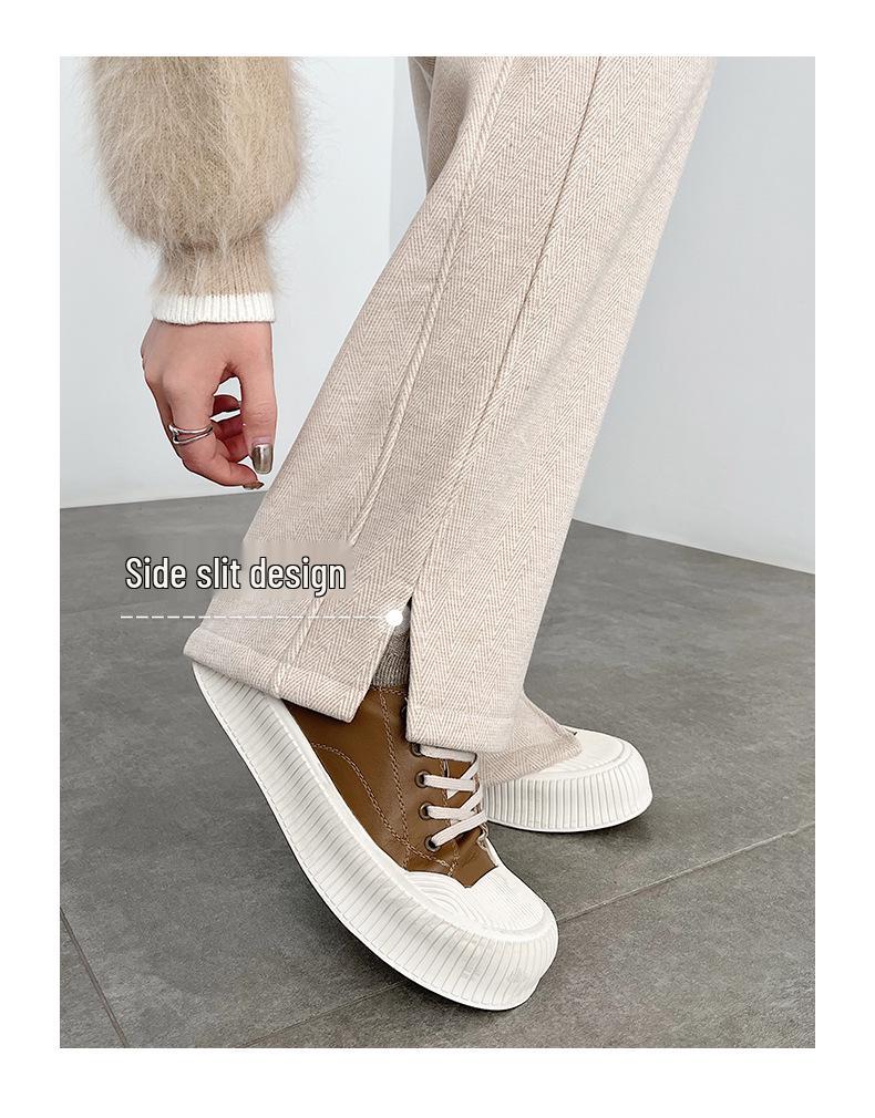 Женские брюки палаццо из шерсти в елочку с разрезами - Коллекция весна/лето 2025