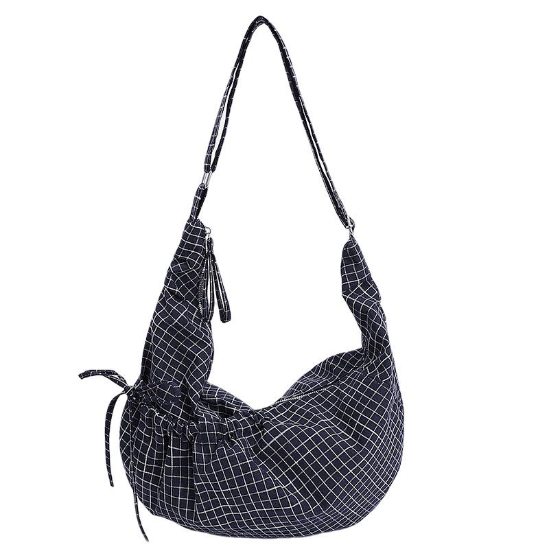 Korean version of fashion plaid shoulder bag 2025 new large-capacity retro commuter messenger bag niche foreign style dumpling bag