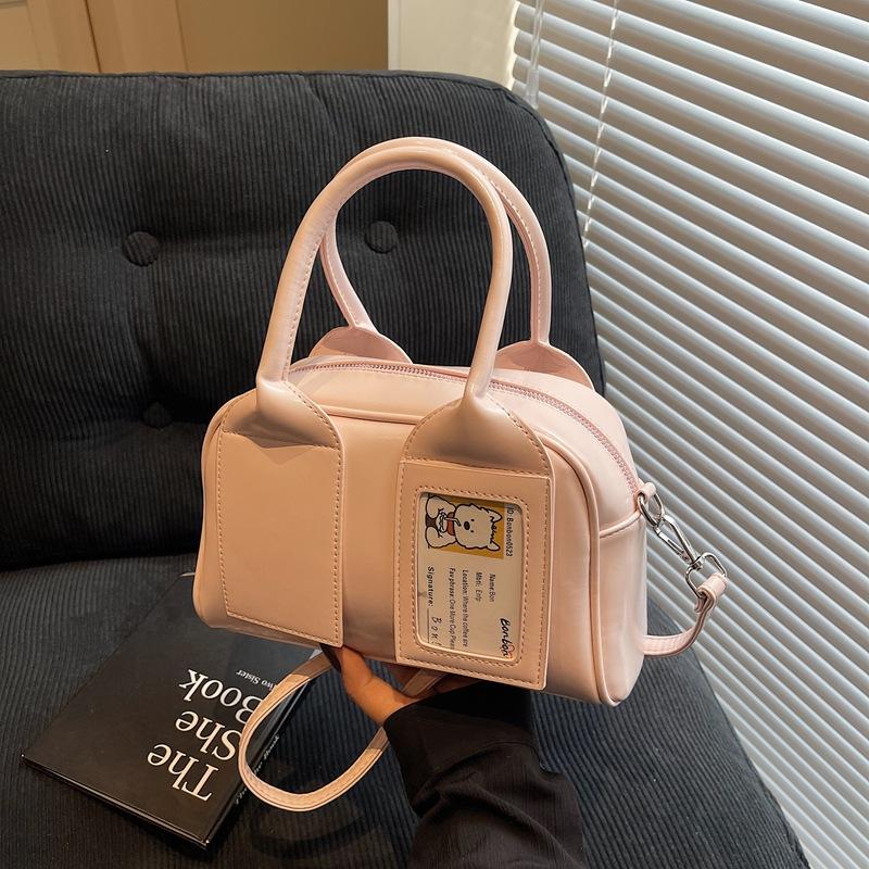 В этом году популярны сумки-бостон для женщин, новые универсальные сумки-мессенджеры для весны и лета 2025, простые женские портативные сумки-подушки.