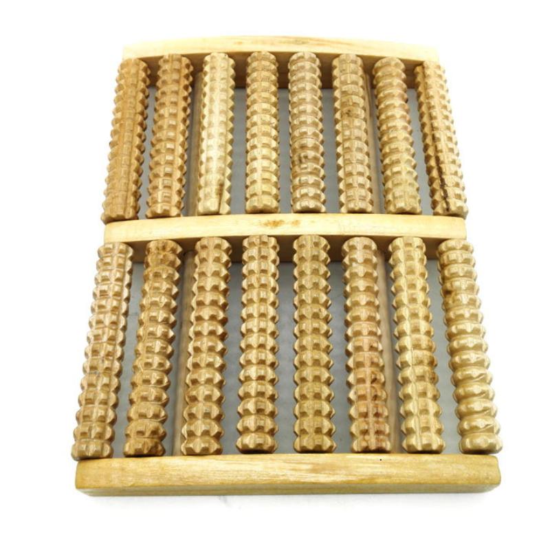 Деревянный массажный ролик для ног для рефлексотерапии и облегчения боли. Терапевтическое устройство, способствующее снижению стресса и здоровью ног.