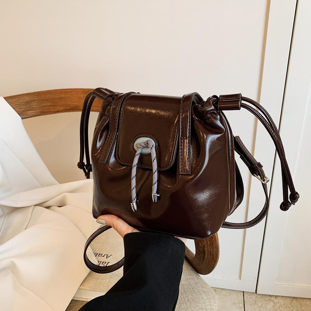 Модный тренд контрастная сумка в стиле ретро, новый нишевый дизайн, одно плечо, диагональная перекрещивающаяся сумка-ведро с завязками