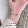 New Tang grass pattern couple bracelet silver-plated roll grass pattern enamel painted gold solid bracelet New Chinese Qixi Festival gift