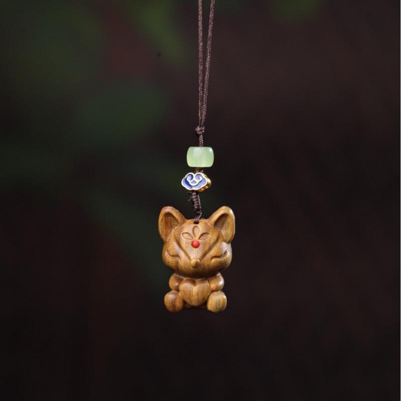 Twelve Zodiac Animal Charms Green Sandalwood Set: Rat, Ox, Tiger, Rabbit, Dragon, Snake, Horse, Sheep, Monkey, Rooster, Dog, Pig.