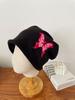 European and American butterfly knitted wool hat female dopamine personalized pullover stacking hat warm ear protector bag head cold hat