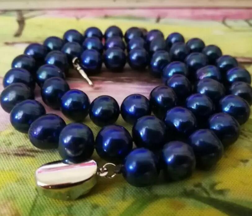 Потрясающее круглое ожерелье с таитянским черным жемчугом диаметром 9-10 мм.