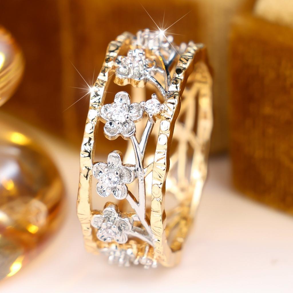 Two-tone hollow floral branch zircon ring Forest-style, artistic, and vintage floral ring with contrasting colors and a wide band