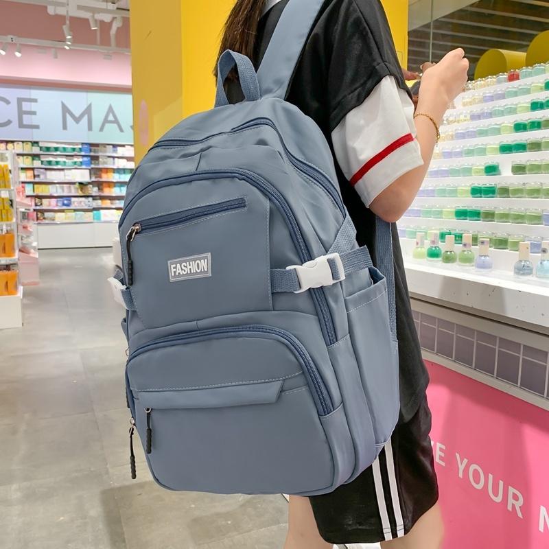 IELGY Korean Version of the Casual Large-capacity Backpack Female Simple Primary School Junior High School Student Bag