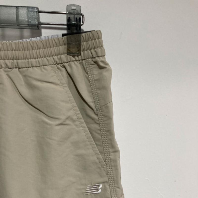 New Balance Шорты Uni Heritage 4.5 Nbnvf21013 бежевые