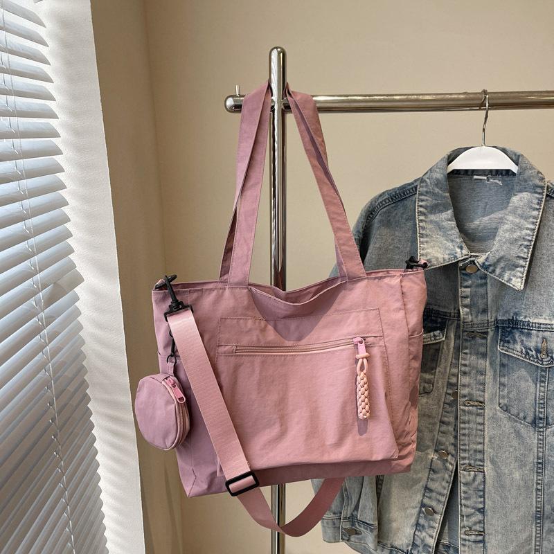 Красивая сумка-тоут, женская, трендовая, портативная, на плечо, 2025 новая, простая однотонная, большой вместимости, сумка-мессенджер