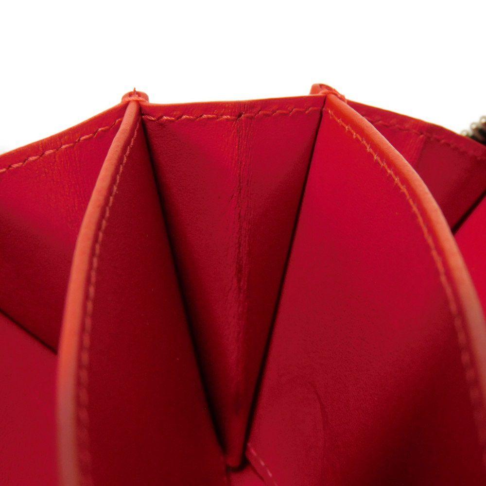 Б/у 9605 Кошелек для монет Панеттоне 3175223 7943 Логотип Металлический кошелек на молнии по периметру с шипами Розовый Женский из Японии