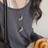 2024 Women's Black Leather Rope Necklace: Korean Croissant Clavicle Chain for Sweaters, Versatile and Elegant.
