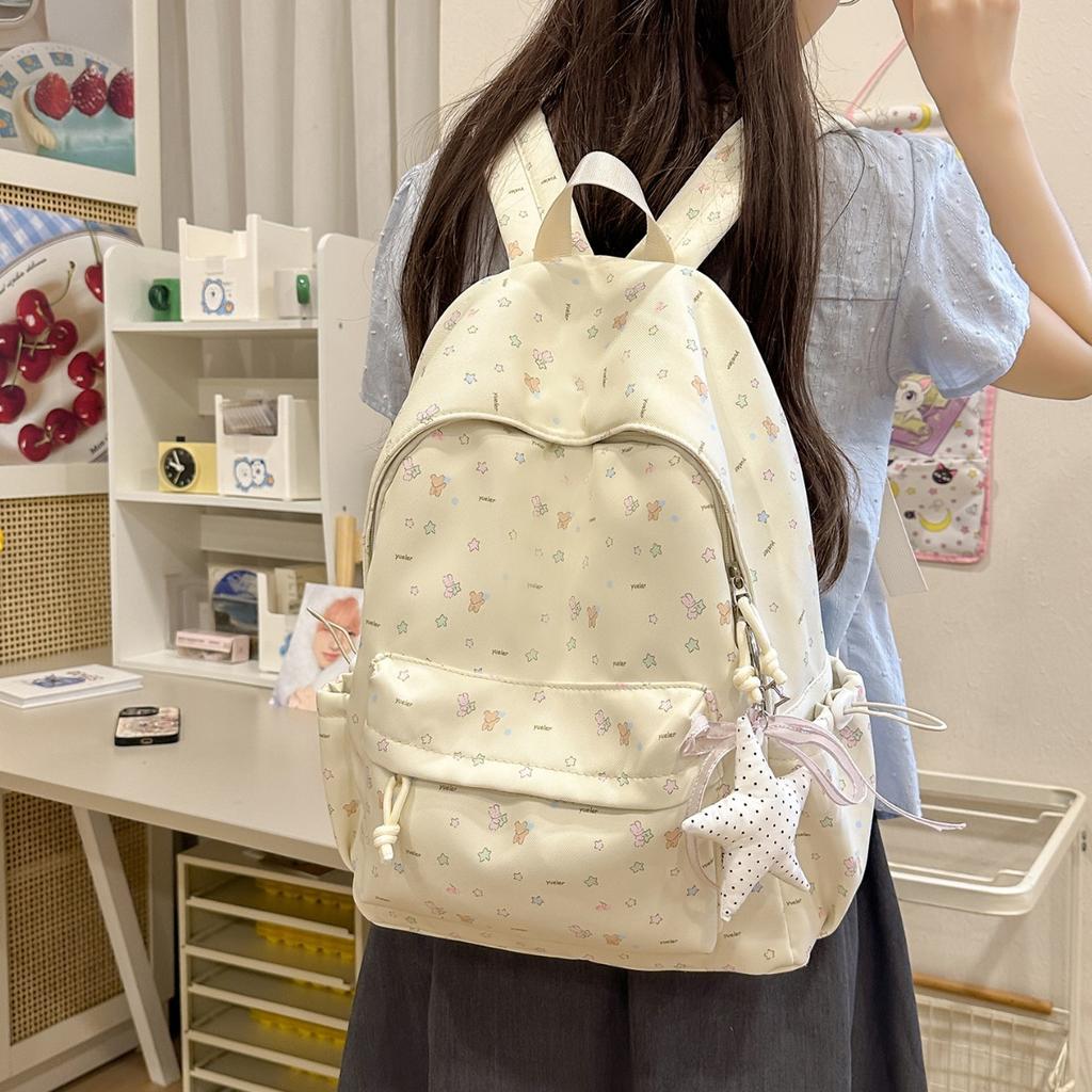Schoolbag Korean gentle floral backpack junior high school girls schoolbag simple and versatile star pendant commuter student backpack