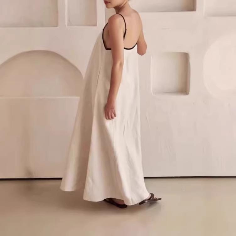 A-shaped pendulum silhouette minimalist holiday skirt, solid color loose suspender cotton and linen long dress