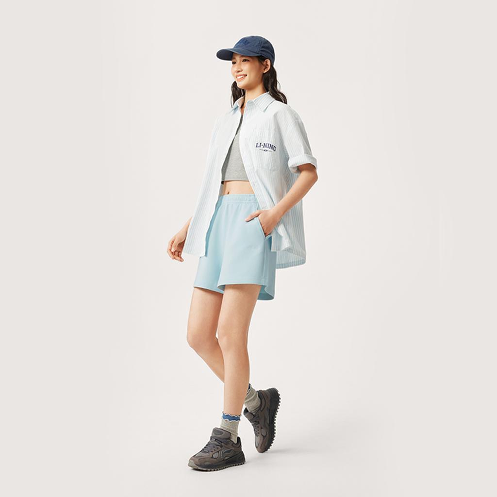 Li Ning Sports Trend Series Однотонные Шорты средней посадки Дышащие Универсальные Прямые Повседневные Женские шорты Светло-голубой AKSV178-1