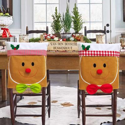 Рождественское украшение на спинку стула в виде пряничного человечка