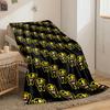 Yellow outlined monsters with open mouths repeating on black background. for all seasons blanket lunch break throw gift