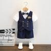 Boys' 2025 British Style Tuxedo Set: Elegant Flower Boy Suit for Piano Performance.