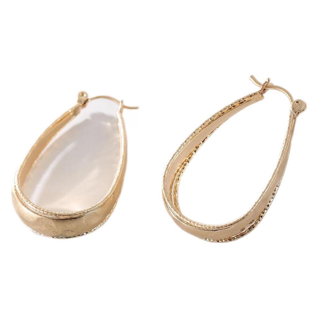 Минималистичные металлические серьги-кольца: Уникальный, смелый и стильный дизайн, который подчеркнет вашу модную ауру.