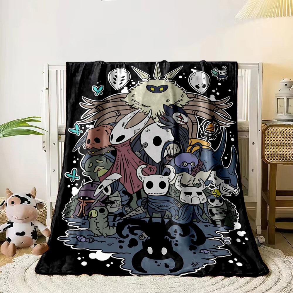 Cluster of stylized bug-like characters with varied designs and colors. for all seasons blanket lunch break throw gift