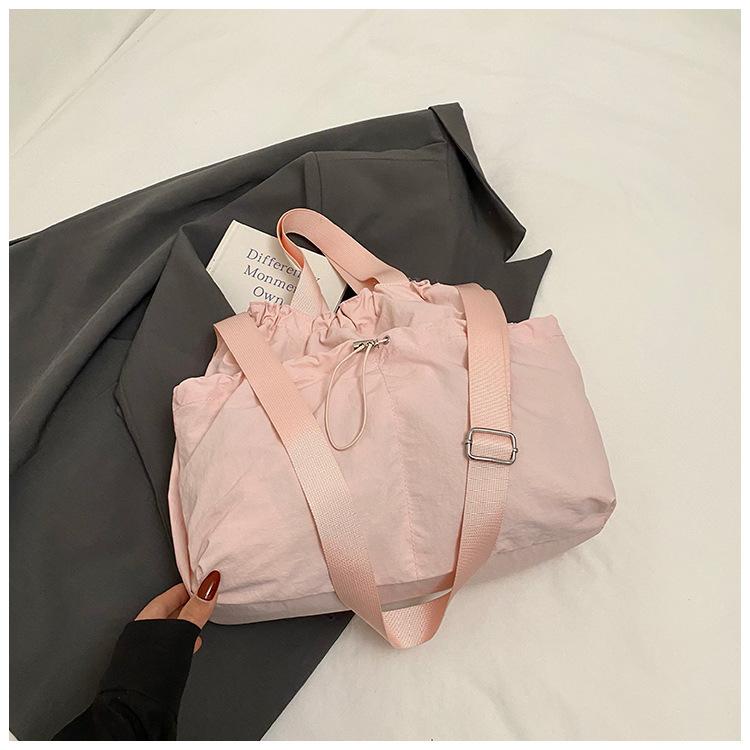 2025 Japanese Hansen Lazy Wind Canvas Bag Women's Large Capacity Drawstring Handbag High Value College Student Class Bag