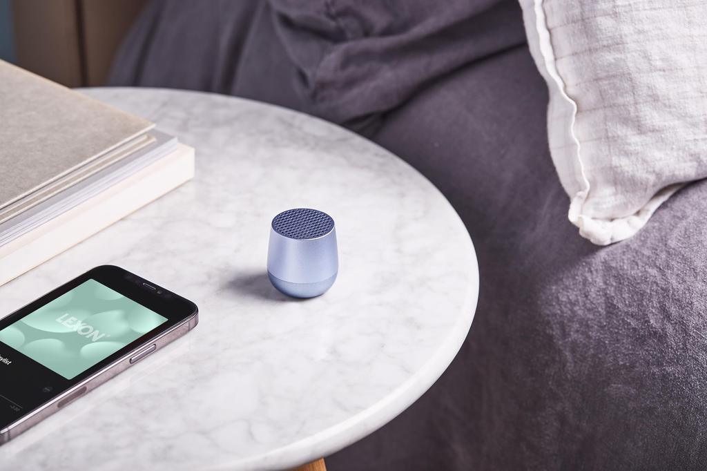 LEXON Wireless Speaker Light Up to 3 hours of continuous playback C wireless charging Connects to 2 devices microphone Selfie shutter function Mino+