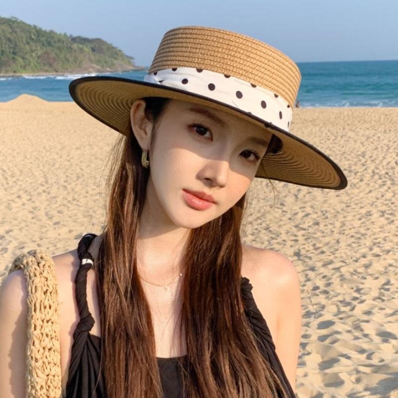 Seaside holiday wind woven hat female high sense Hepburn wind polka dot straw hat casual versatile film hat female