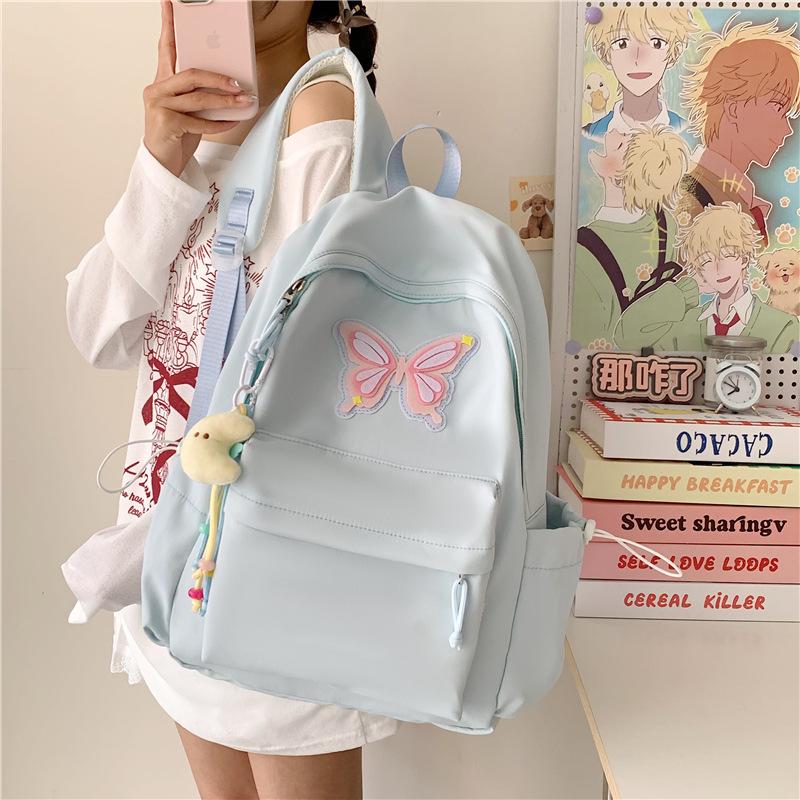 Spring and summer new student cute backpack women's fashion simple printing butterfly junior high school large-capacity schoolbag women