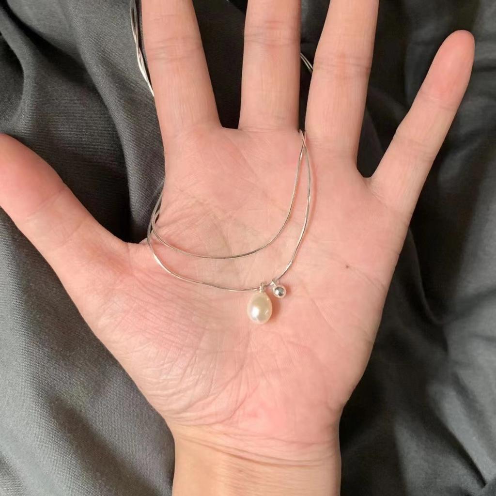 Double-layer stacked wearing imitation pearl necklace women's 2026 new niche light luxury high-end clavicle chain temperament simple neck chain