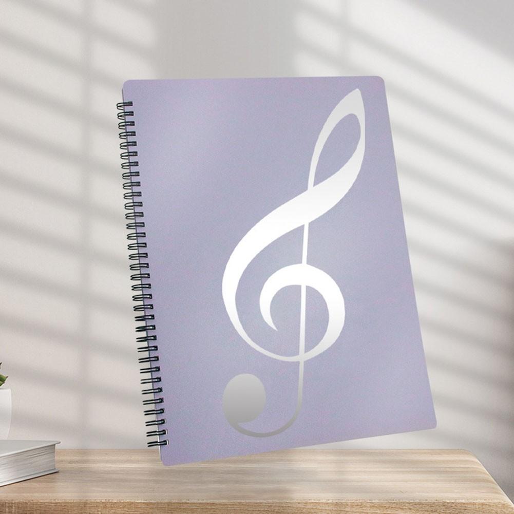 Рукописная тетрадь с гибким станом для музыки, перелистывание страниц