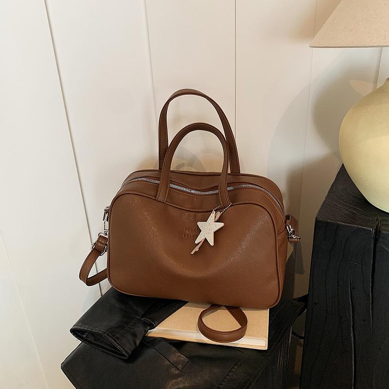 Простая ручная сумка в стиле ретро, портативная сумка для поездок на работу, новая нишевая сумка-подушка высокого класса, вместительная женская сумка