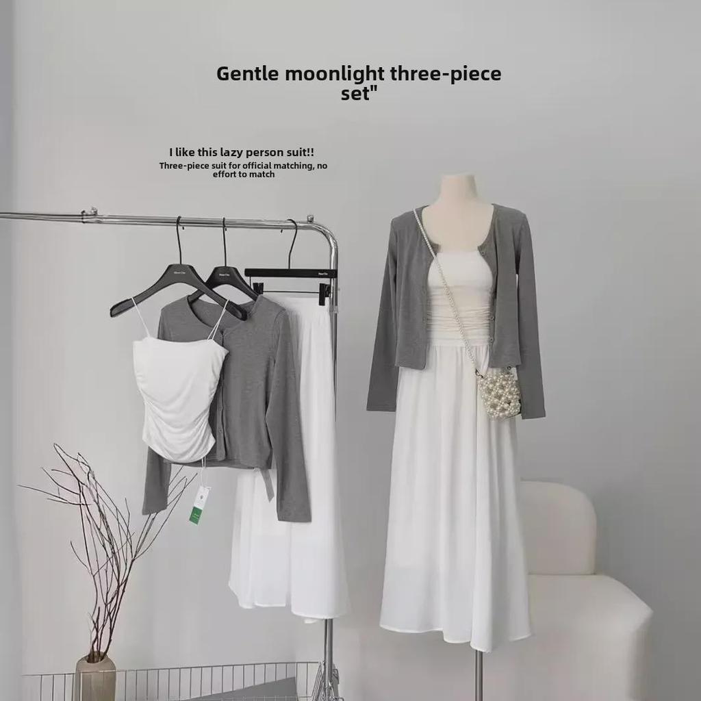 White Moonlight Women's Three-Piece Set: High-Waist Skirt, Cardigan, and All-Match Gray Suspenders for Spring and Autumn.
