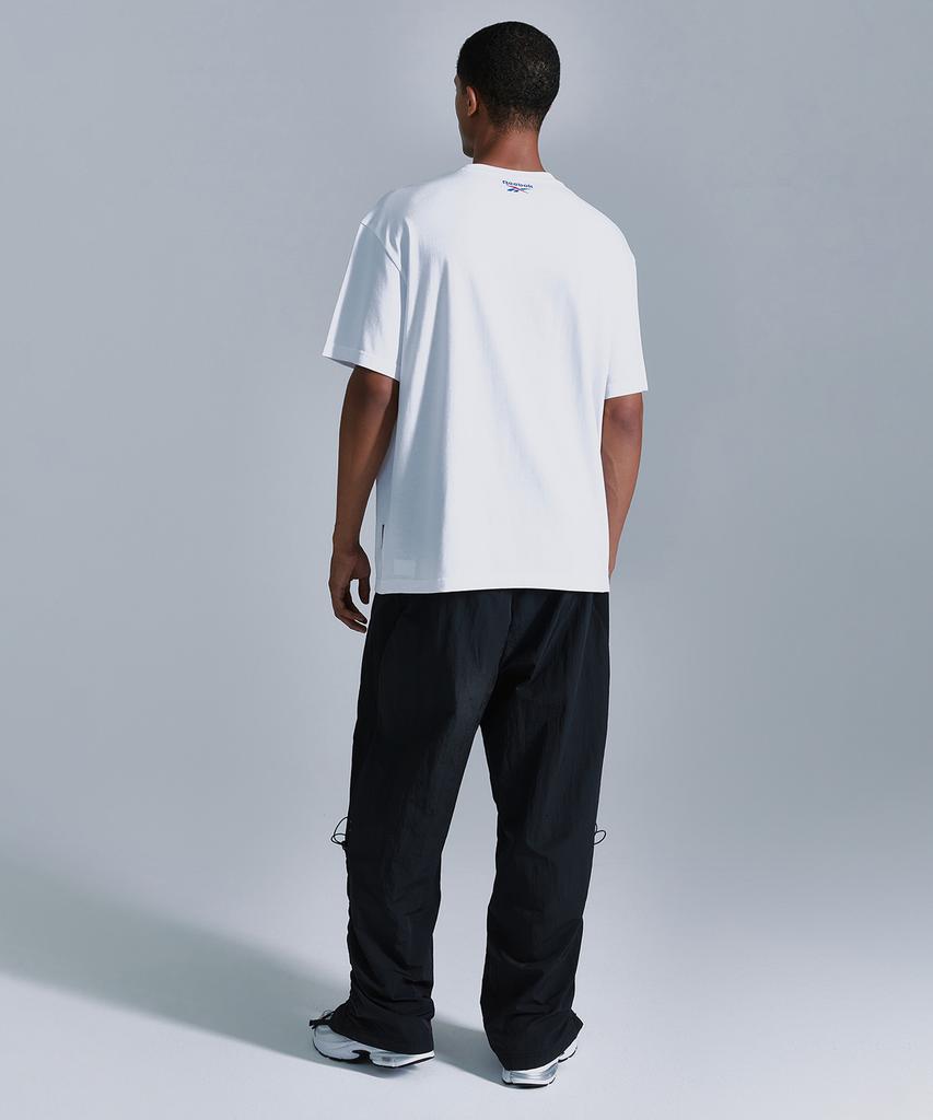Reebok Широкие брюки Rival Ripstop - Черный