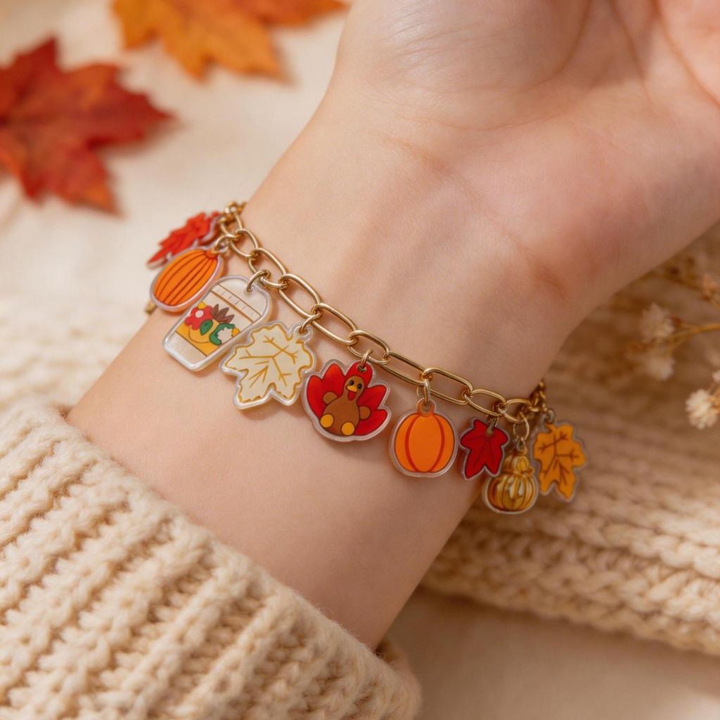 Thanksgiving Day-themed bracelet featuring cute acrylic charms and playful ghost and pumpkin decorations.